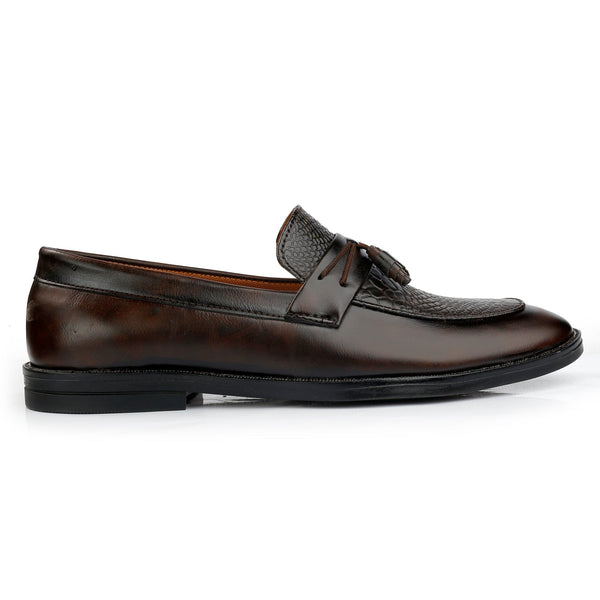 Brown leather loafer shoe on a white background