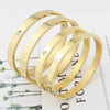 Glistening Cross-Nut Nail Bracelet - SunglassesMart