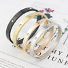 Glistening Cross-Nut Nail Bracelet - SunglassesMart