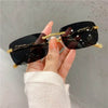 Edgy Retro Chic Rimless Sunglasses - SunglassesMart